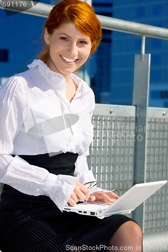 Image of happy businesswoman