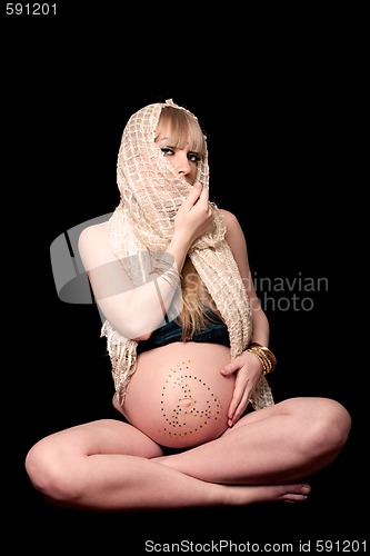 Image of Pregnant woman with veil