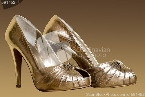 Image of gold woman shoes