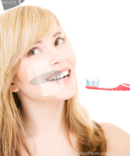 Image of happy girl with toothbrush