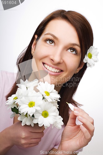 Image of Beautiful woman with flowers