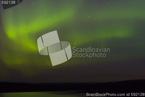 Image of northern lights of green color