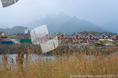 Image of Red houses near lake