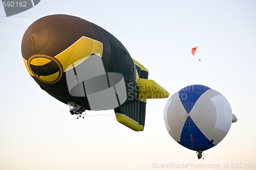 Image of two flying dirigibles