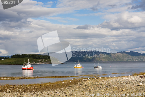 Image of lake with fishing boats