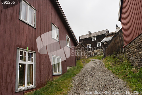 Image of Footpath between wooden houses
