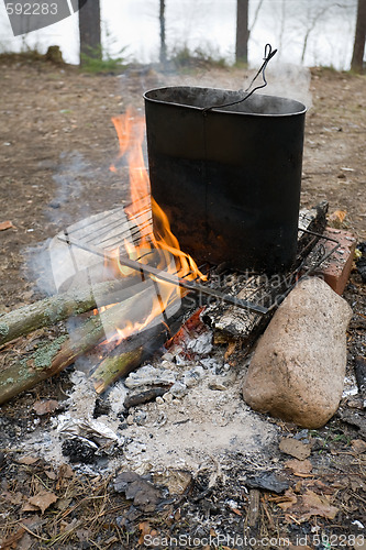 Image of cooking on campfire