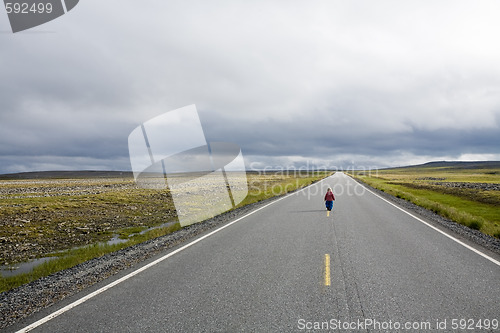 Image of girl staying on highway