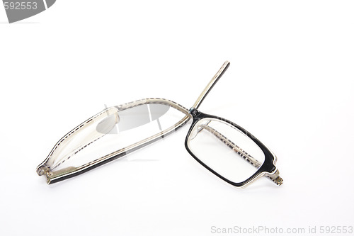 Image of broken eyeglasses