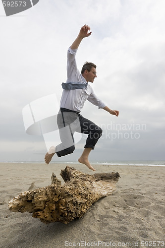 Image of Businessman overcoming an obstacle