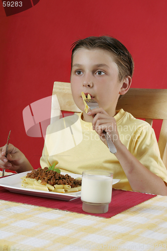 Image of Child eating food