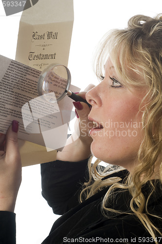 Image of woman inspecting document