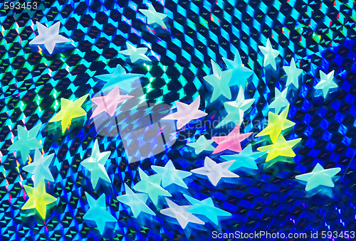 Image of Stars over shining blue background