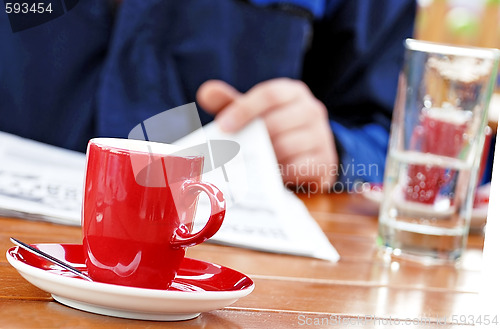 Image of Morning coffee and newspaper