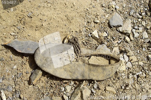 Image of dusty lost shoe