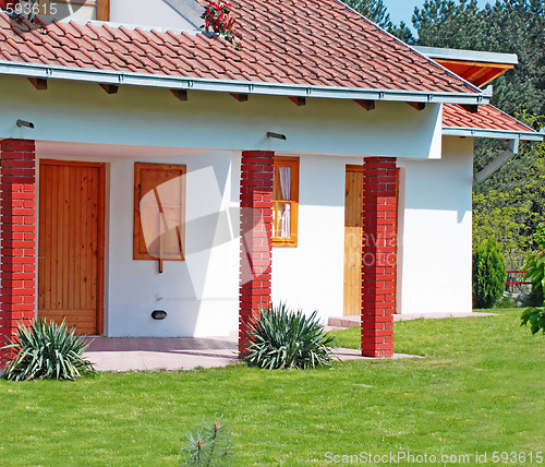 Image of Small house and lawn