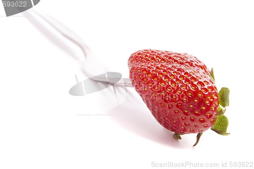 Image of fork and fresh strawberry