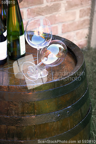 Image of Wine over wood barrel