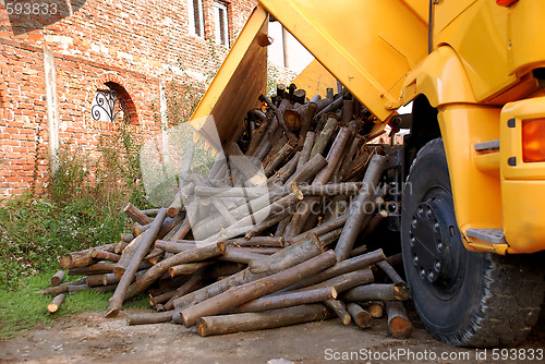 Image of Unloading wood