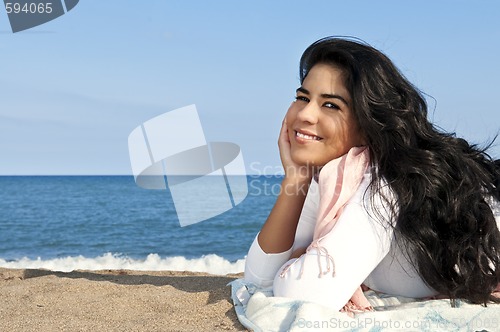 Image of Young native american woman at beach