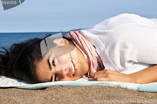 Image of Young native american woman at beach