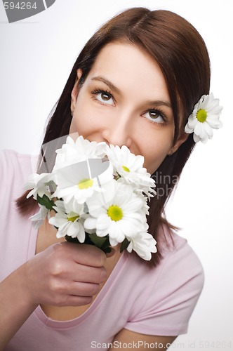 Image of Smelling flowers