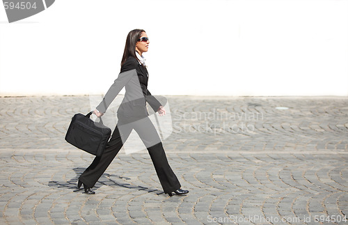 Image of Businesswoman in a hurry