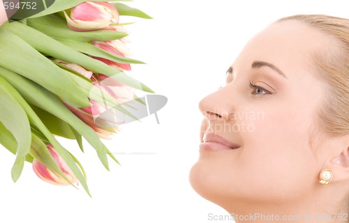 Image of happy woman with flowers