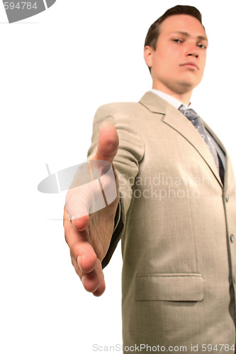 Image of Serious businessman offering for a handshake