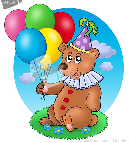 Image of Bear clown with balloons on meadow