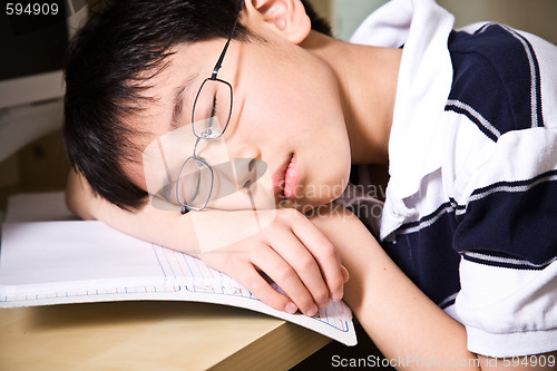 Image of Sleeping young student