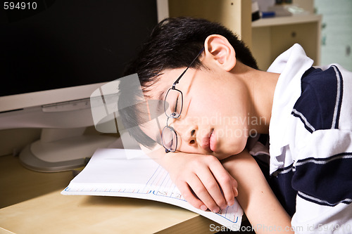 Image of Sleeping young student