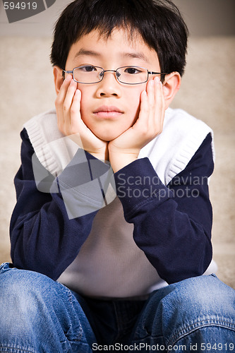 Image of Sad asian boy