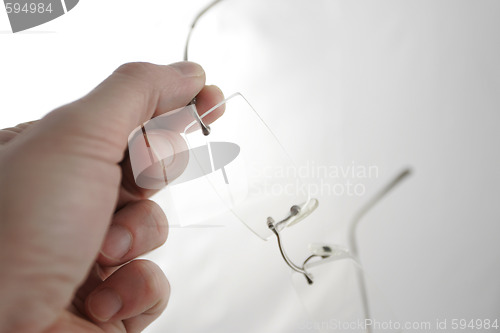 Image of Holding glasses