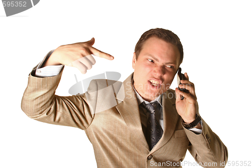 Image of Businessman shouting on a phone