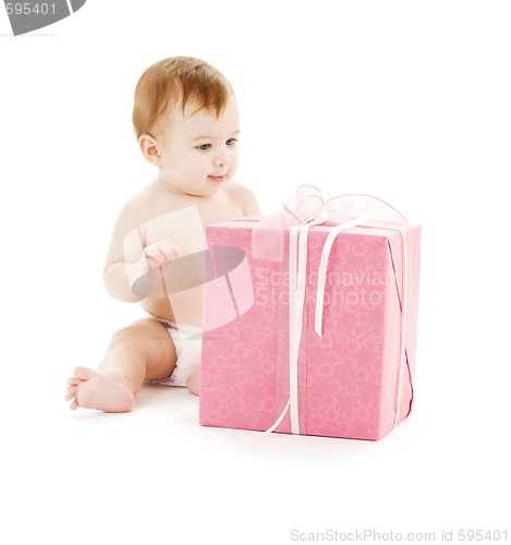 Image of baby boy with big gift box