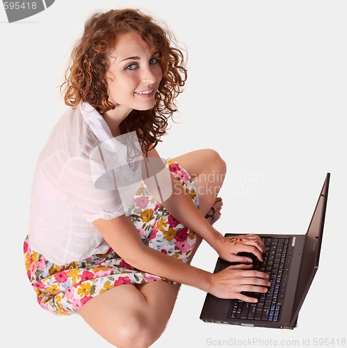 Image of Casual woman on laptop