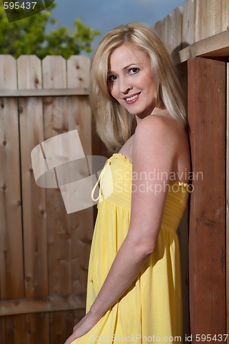 Image of Woman in yellow dress