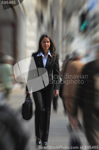 Image of Businesswoman in a hurry