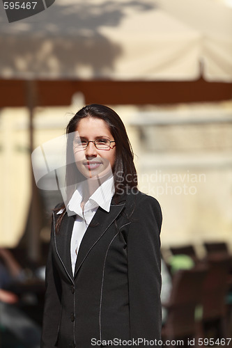 Image of Portrait of a young woman with glasses