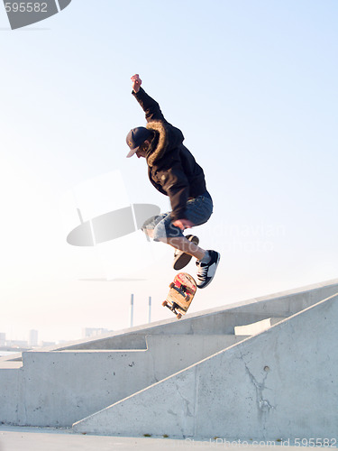 Image of Modern teenage skater catching some air