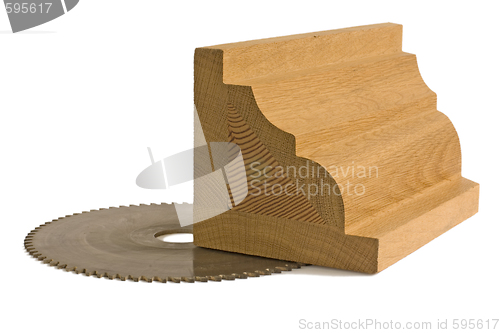 Image of wood billet for furniture with saw-blade