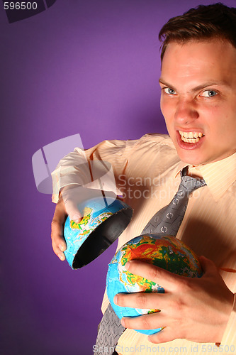 Image of Evil businessman destroying the world