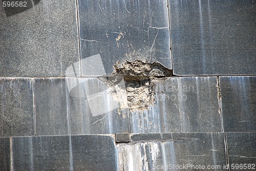 Image of Hit over marble wall