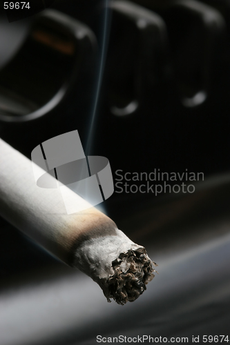 Image of cigarette in ashtray