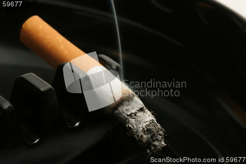 Image of cigarette in ashtray