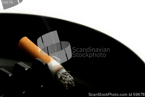 Image of cigarette in ashtray