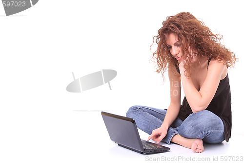 Image of young woman using laptop