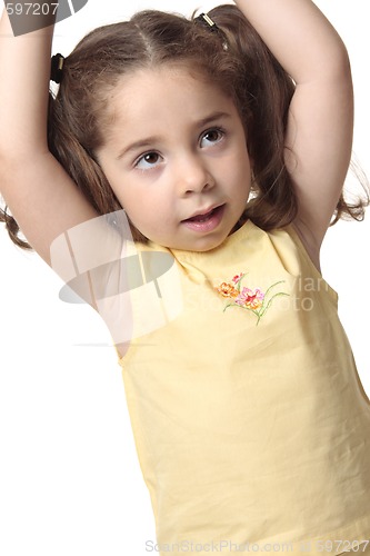 Image of Toddler girl arms above head