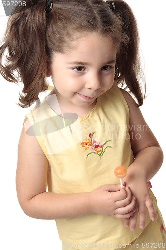 Image of Shy toddler girl smiling